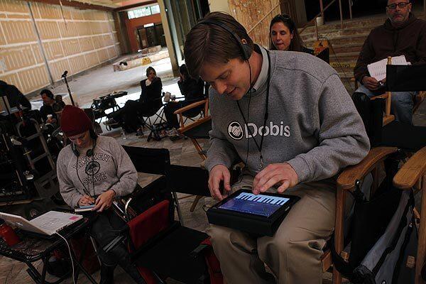 Costar, co-writer and co-director Tim Heidecker composes music for the movie on his iPad.