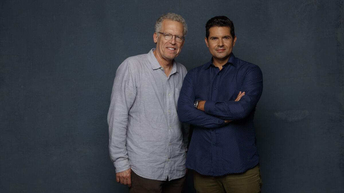 Carlton Cuse, left, and Graham Roland, photographed in the L.A. Times Photo and Video Studio at Comic-Con 2018 in San Diego, are the creators of new Amazon series "Tom Clancy's Jack Ryan."