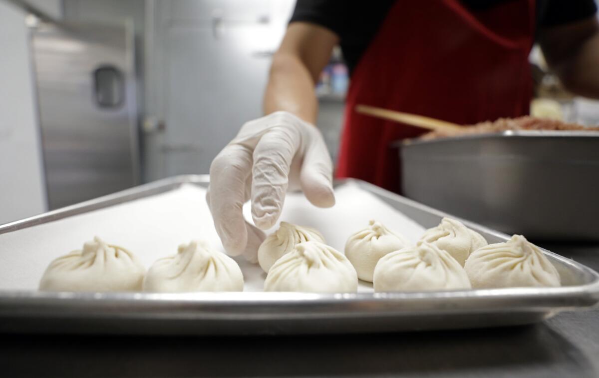 Dumplings are made for Cali Dumpling at a production facility in El Monte.