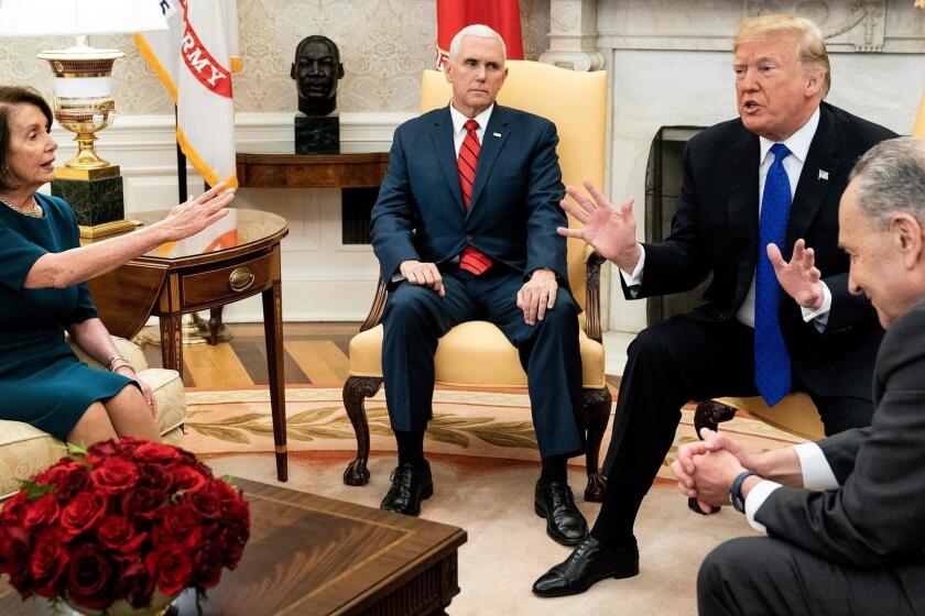 (FILES) In this file photo taken on December 11, 2018 (FILES) In this file photo taken on December 11, 2018, US Vice President Mike Pence (2L) listens while Democratic US Representative Nancy Pelosi (L), US President Donald Trump (2R) and Democratic Senate Minority Leader Charles Schumer argue about the impending government shutdown during a meeting at the White House in Washington, DC. - Call Donald Trump an egomaniac, call him a showoff. Accuse him of getting kicks from insulting and humiliating people. The thing is, he might just agree. The uniqueness of the 45th US president among world leaders extends to the pride he takes in his brazenly unconventional persona. Trump doesn't just admit to a litany of character flaws and actions that would sink an ordinary politician. He revels in them. "The show is 'Trump' and it is sold-out performances everywhere. I've had fun doing it and will continue to have fun." On January 20, 2019, 72-year-old Trump reaches the halfway mark of his presidency's first term. (Photo by Brendan Smialowski / AFP)BRENDAN SMIALOWSKI/AFP/Getty Images ** OUTS - ELSENT, FPG, CM - OUTS * NM, PH, VA if sourced by CT, LA or MoD **