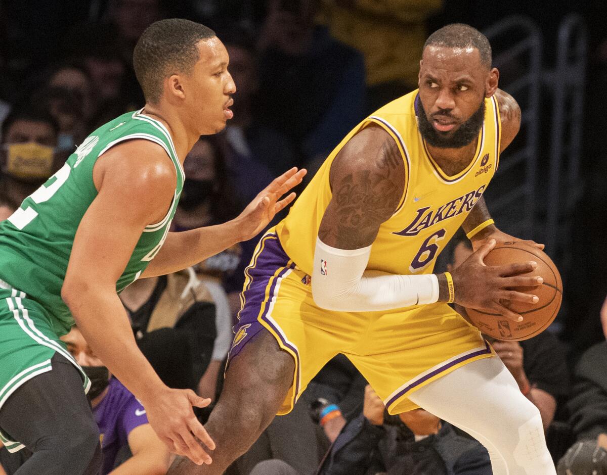 Boston Celtics forward Grant Williams guards Lakers forward LeBron James.