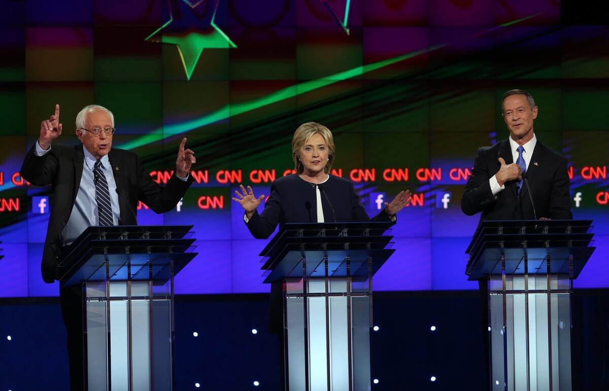 Sen. Bernie Sanders, Hillary Clinton and Martin O'Malley take part in the presidential debate sponsored by CNN and Facebook in Las Vegas on Oct. 13.
