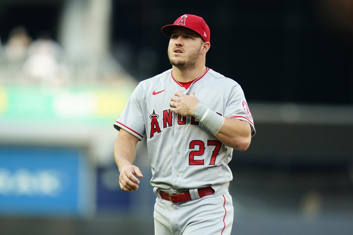 Angels' Mike Trout warms up before a baseball game against the New York Yankees.