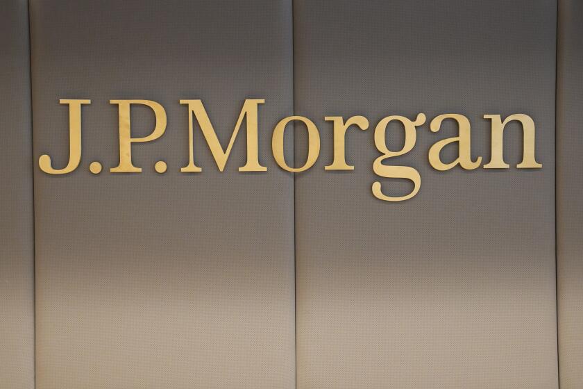 FILE - The logo of JPMorgan bank is pictured at the new French headquarters of JP Morgan bank, Tuesday, June 29, 2021, in Paris. JPMorgan Chase is defending itself against a lawsuit by the U.S. Virgin Islands accusing it of empowering Jeffrey Epstein to abuse teenage girls. Lawyers for the giant bank said in court papers Tuesday, May 23, 2023, that it was the islands that enabled the financier to commit his crimes. (AP Photo/Michel Euler, Pool, File)