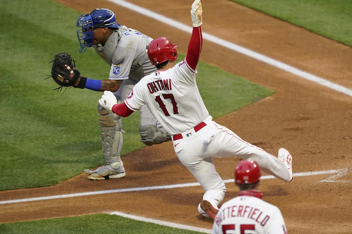 Shohei Ohtani scores in the Angels series-opener against the Kansas City Royals. (AP Photo/Ashley Landis)
