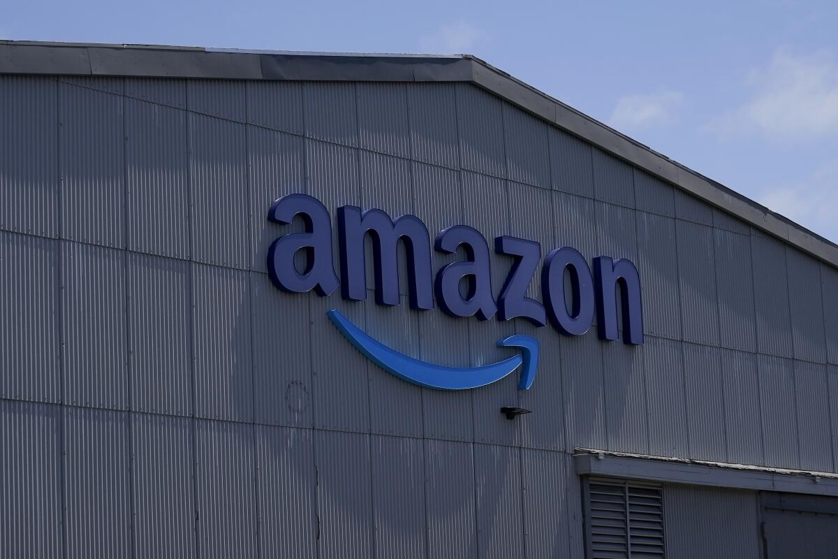 An Amazon sign on a warehouse