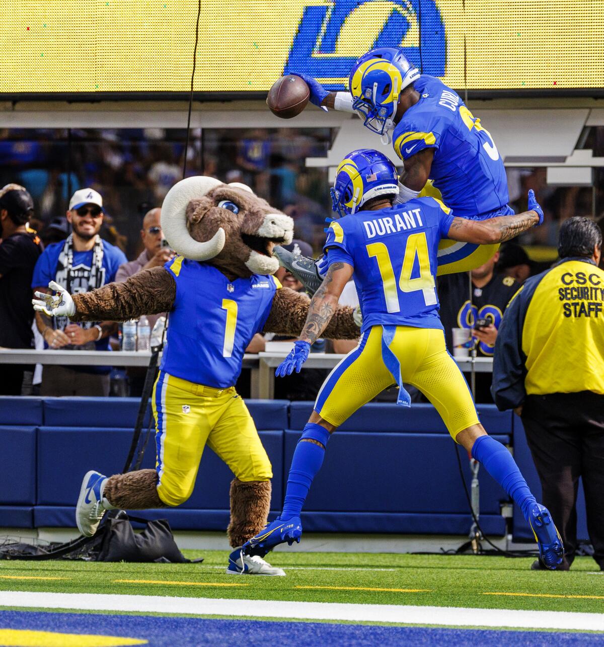 The Rams' Kamren Curl (3) celebrates his 33-yard fumble recovery touchdown with Cobie Durant (14), who forced the turnover.