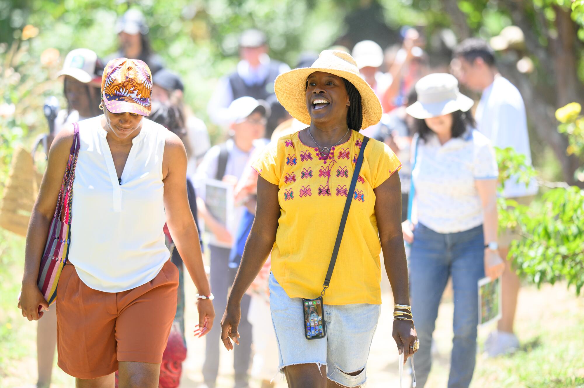 Pandora Thomas leads a U-pick tour group at the non-profit permaculture farm EARTHseed.