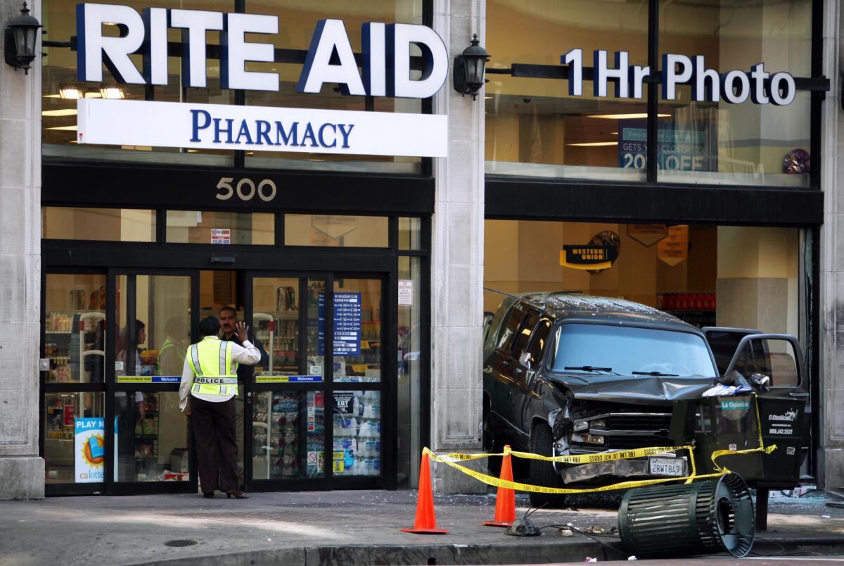 Four people were taken to the hospital after this SUV crashed into a Rite Aid pharmacy at Broadway and 5th Street in downtown Los Angeles.