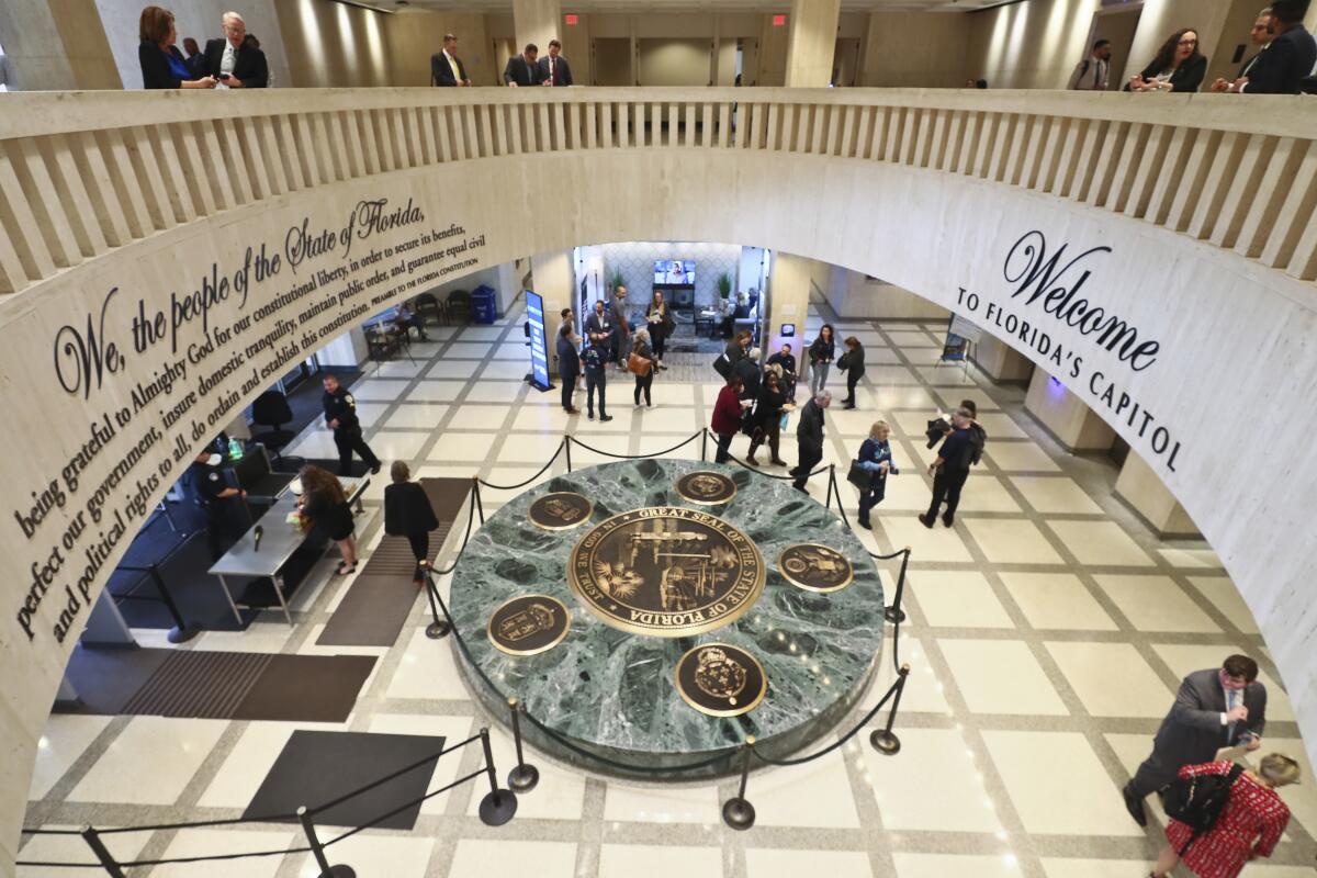 An overhead view of a rotunda with an inscription that includes 'welcome'