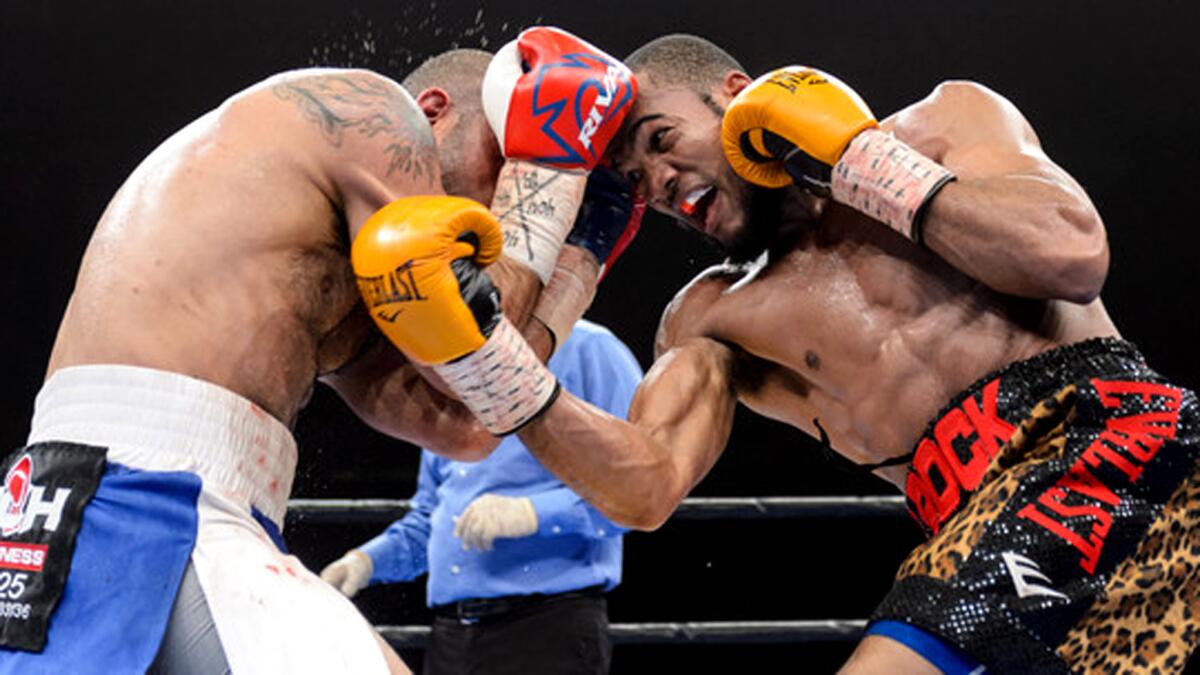 Julian Williams goes on the offensive during a light-heavyweight fight against Joey Hernandez on April 4, 2015.