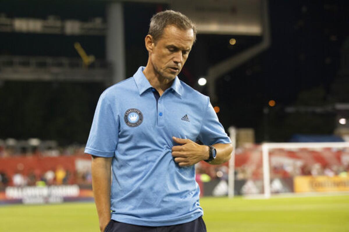 Charlotte FC head coach Christian Lattanzio reacts during his team's loss to Toronto FC in an MLS soccer match in Toronto, Saturday July 23, 2022. (Chris Young/The Canadian Press via AP)