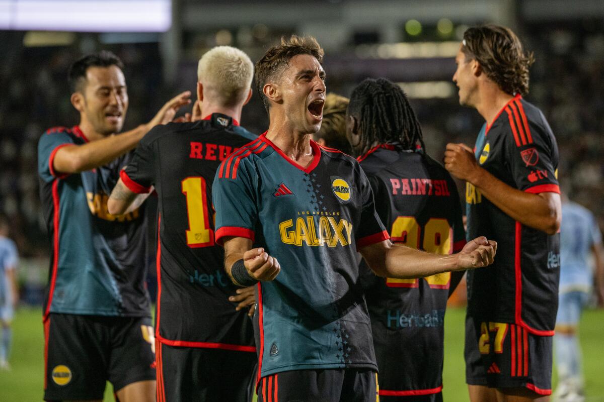 Galaxy midfielder Gastón Brugman celebrates a goal by Marco Reus during a win over Atlanta at Dignity Health Sports Park.