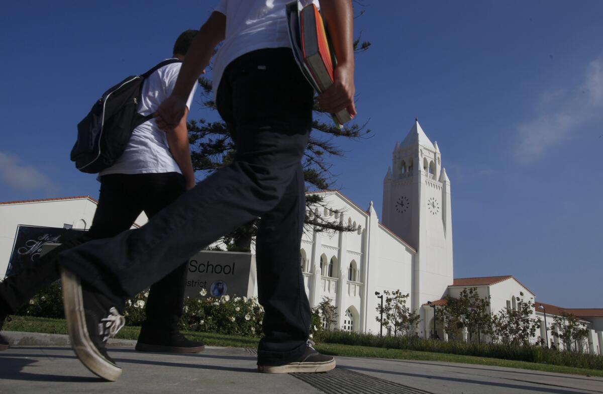 A graduate of Newport Harbor High School, shown above in 2012, has filed a lawsuit saying she was deprived of a quality education after suffering a traumatic brain injury.