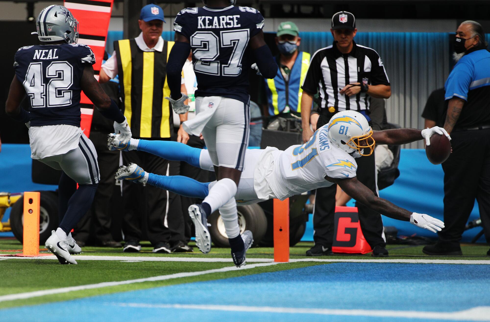 Chargers wide receiver Mike Williams dives into the end zone to score on a 12-yard touchdown pass from Justin Herbert.
