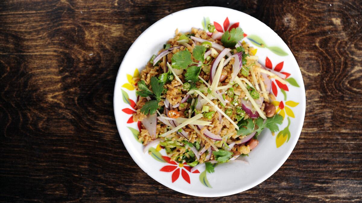 The nam khao tod (crispy rice salad) is a favorite at all of the Night + Market locations.