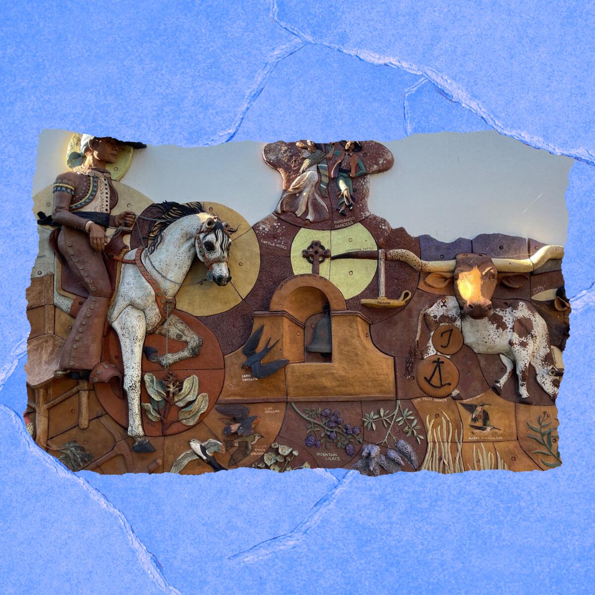 A tile mural shows a man on horseback and mission bells.