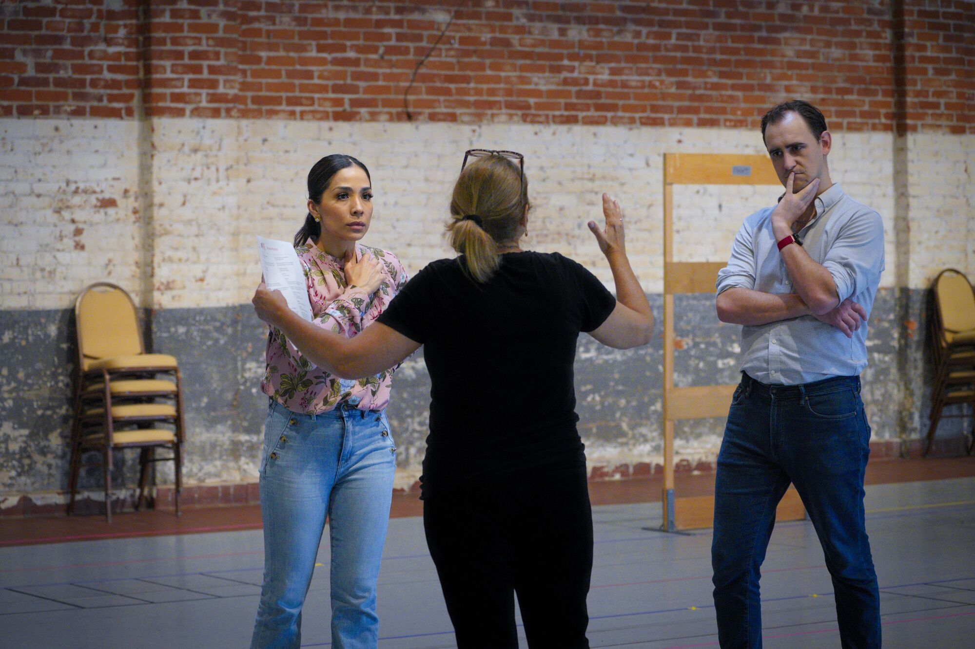 At the rehearsal space at Bread & Salt, director Lorena Maza works with Guadalupe Paz and Federico De Michelis. 