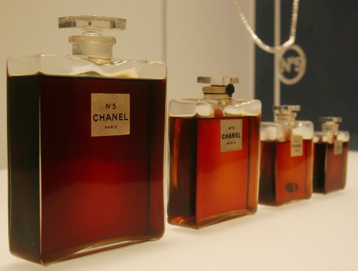 Original flacons of Chanel No. 5 from 1921, displayed during a preview of "Chanel", an exhibition of fashions from the House of Chanel, at the Metropolitan Museum of Art in New York.