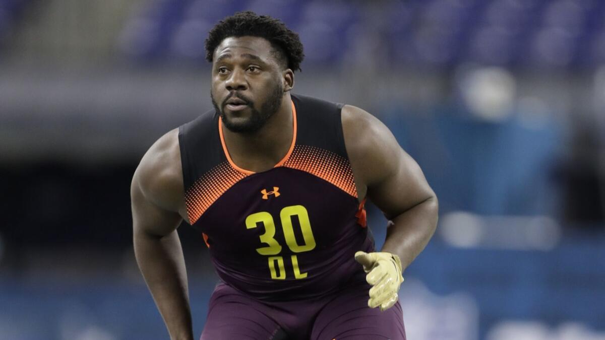 TCU defensive lineman L.J. Collier runs a drill during the NFL scouting combine.