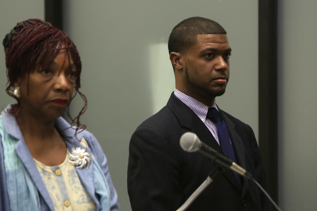 Skyy De'Anthony Fisher appears in a San Diego courtroom in 2014 with his attorney, Maryetta Marks.