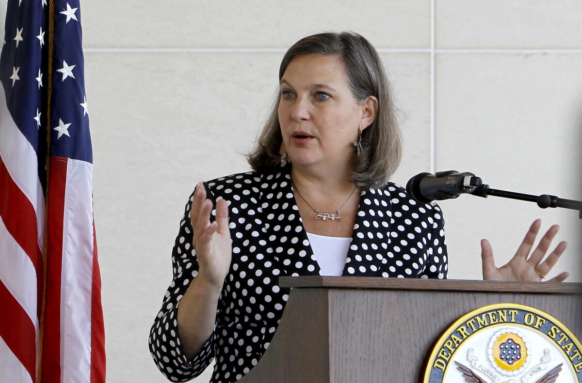 FILE - In this July 11, 2016, file photo U.S. Assistant Secretary of State for European and Eurasian Affairs Victoria Nuland talks to the media at a news conference at the U.S. Embassy in Skopje, Macedonia. The United States and Germany have reached a deal that will allow the completion of a controversial Russian gas pipeline to Europe without the imposition of further U.S. sanctions, a senior U.S. official said Wednesday, July 21, 2021. Under Secretary of State for Political Affairs Victoria Nuland told Congress that the two governments would shortly announce details of the pact that is intended to address U.S. and eastern and central European concerns about the impact of the Nord Stream 2 project. (AP Photo/Boris Grdanoski, File)