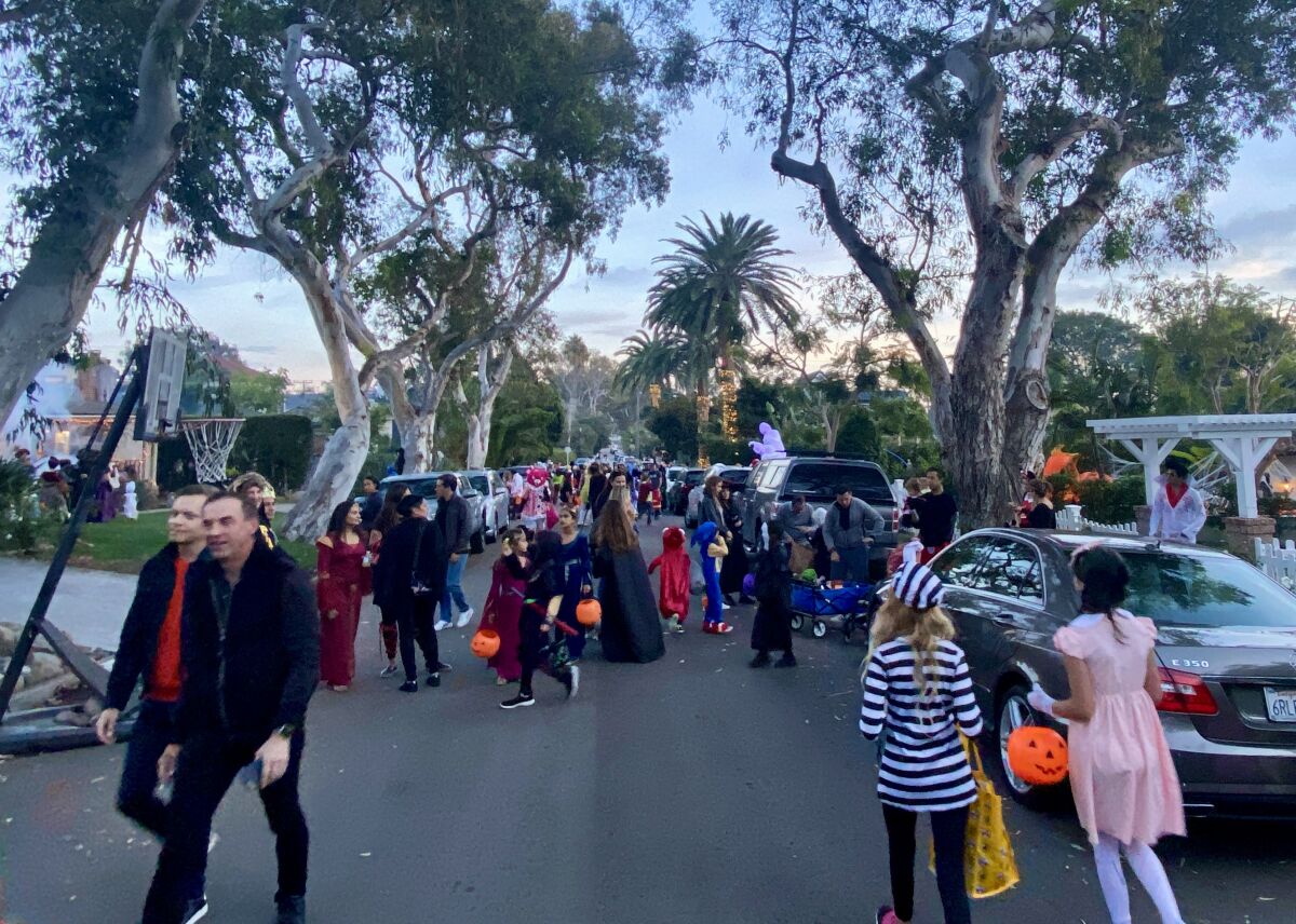 Crowds of trick-or-treaters descend on Bird Rock for Halloween in 2021.