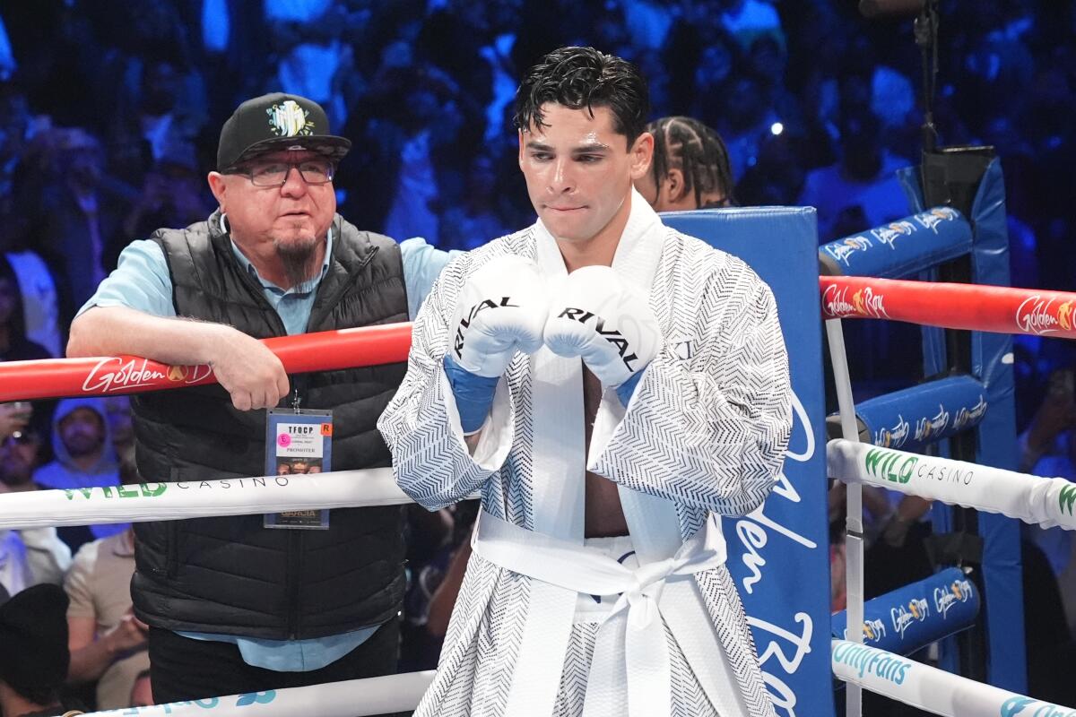 Ryan Garcia arrives in the ring for his super lightweight boxing match against Devin Haney.