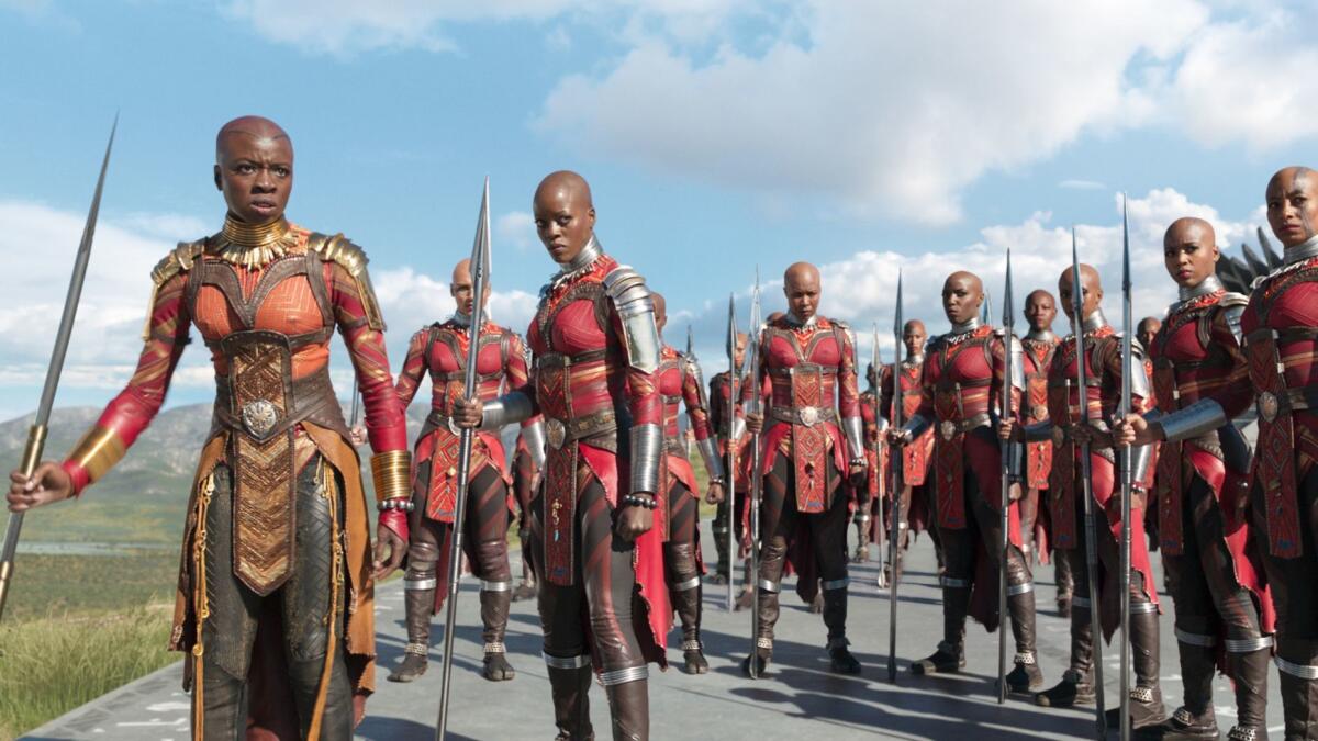 The Dora Milaje warriors in "Black Panther" know there's no place for hair on the battlefield.