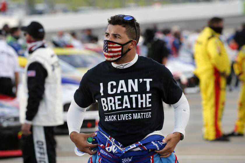 Driver Bubba Wallace wears a Black Lives Matter shirt.