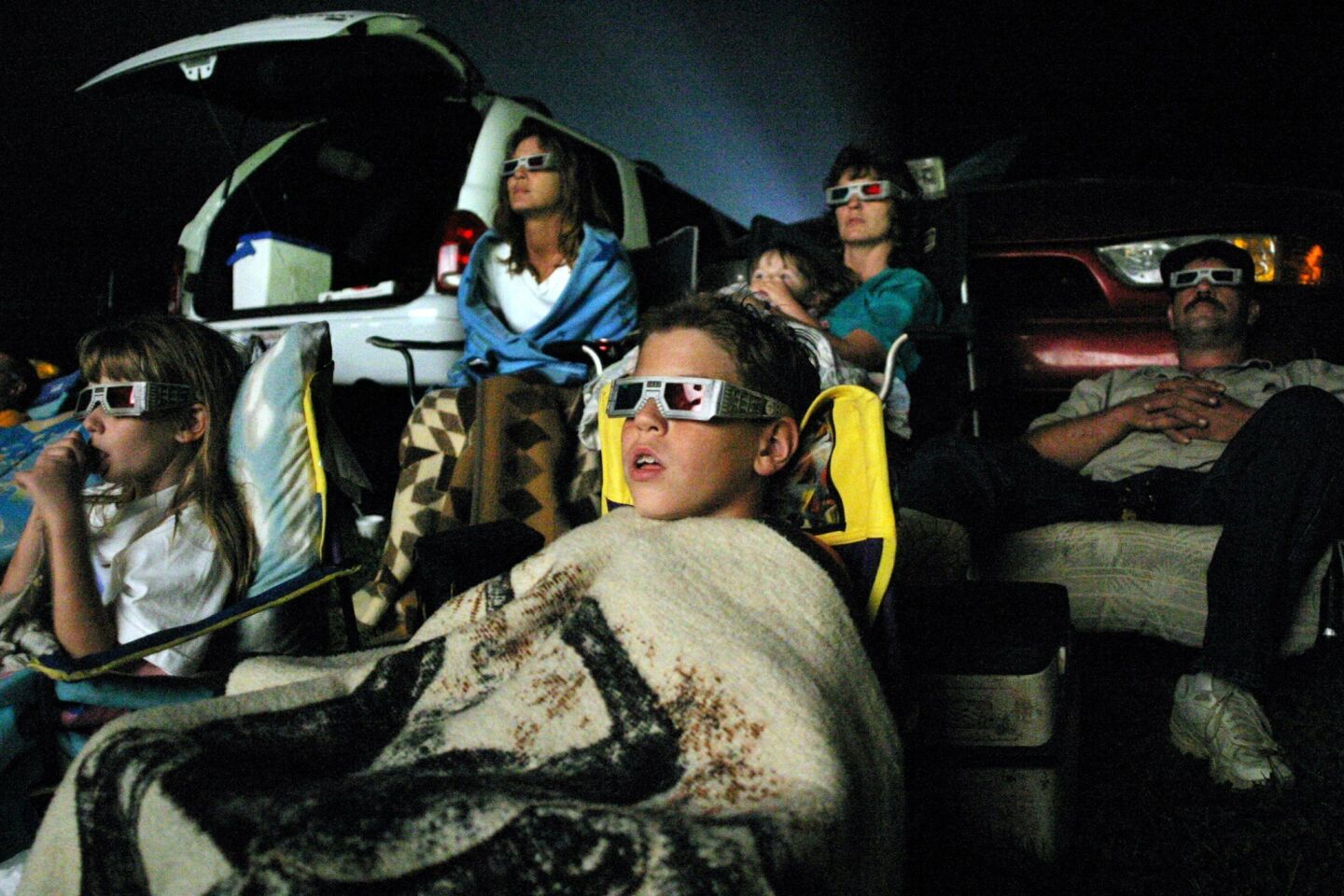 At Hull's in Lexington, Va., a family watches "Spy Kids 3-D."