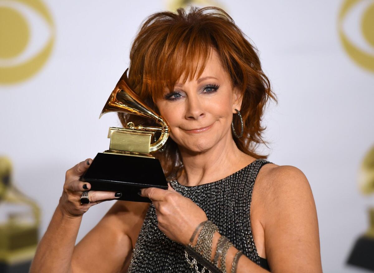 Reba McEntire, winner of the Grammy for roots gospel album, in the press room during the Grammys.