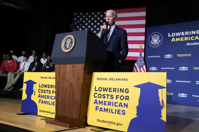 FILE - President Joe Biden speaks about student loan debt relief at Delaware State University, Oct. 21, 2022, in Dover, Del. A federal appeals court has allowed the U.S. Education Department to move ahead with a plan to lower monthly payments for millions of student loans borrowers. (AP Photo/Evan Vucci, File)