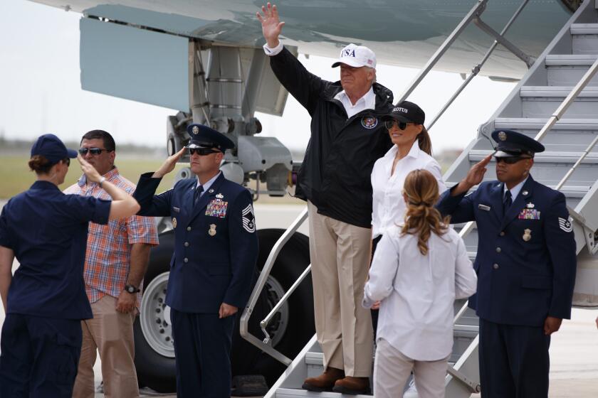 President Donald Trump and first lady Melania Trump arrive on Air Force One at Corpus Christi International Airport on Tuesday.