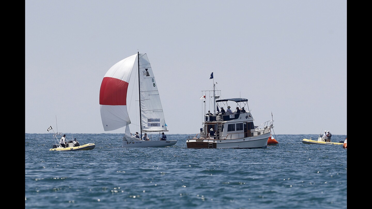 Skipper Harry Price (8) of the Cruising Yacht Club of Australia sails with crew members Angus Williams and Harry Hall as they compete during 52nd annual Governorâ€™s Cup in Newport Beach on Wednesday, July 18.