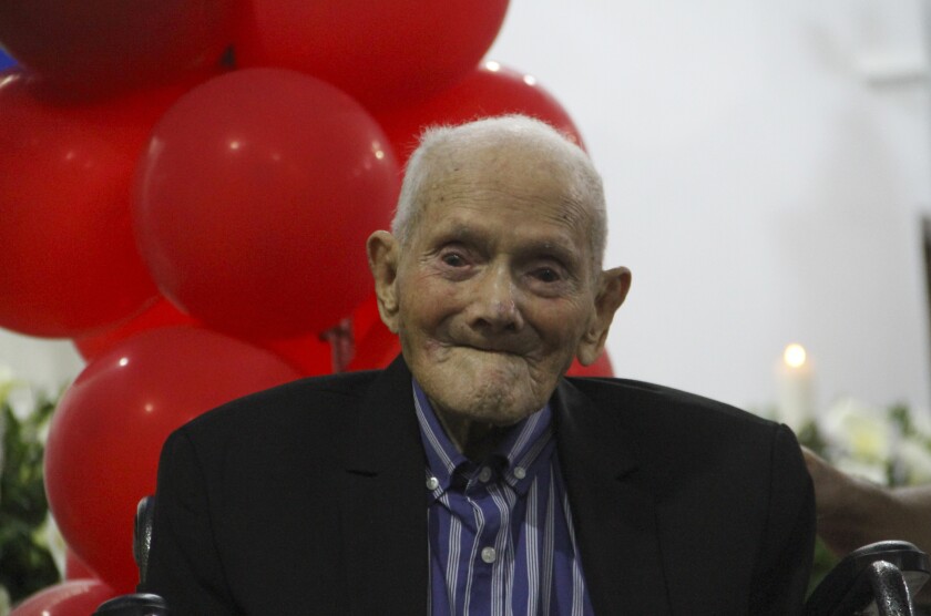 Juan Vicente Pérez Mora, quien según Guinness World Records es el hombre de más edad del mundo, durante una misa