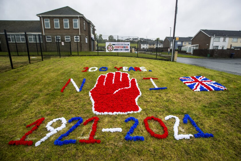 A display on grass celebrating the 100 year centenary of Northern Ireland, in Ballyduff, Newtonabbey, Northern Ireland, Monday, May 3, 2021. Queen Elizabeth II has stressed the need for “reconciliation, equality and mutual understanding” as she sent her “warmest best wishes” to the people of Northern Ireland to mark what is widely considered to be its centenary. Northern Ireland was created on May 3, 1921, when the Government of Ireland Act came into effect and partitioned the island of Ireland into two separate entities. Northern Ireland became part of the U.K. alongside England, Scotland and Wales. (Liam McBurney/PA via AP)