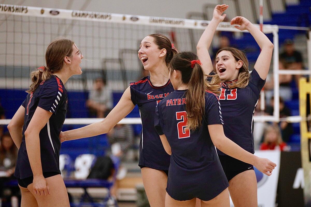 Beckman players (from left) Camryn Hayek, Olivia Ramirez, Kristine Tran and Sophia Saad celebrate Saturday.