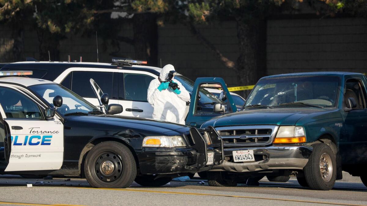 Investigators at scene of officer-involved shooting in Torrance early Saturday.