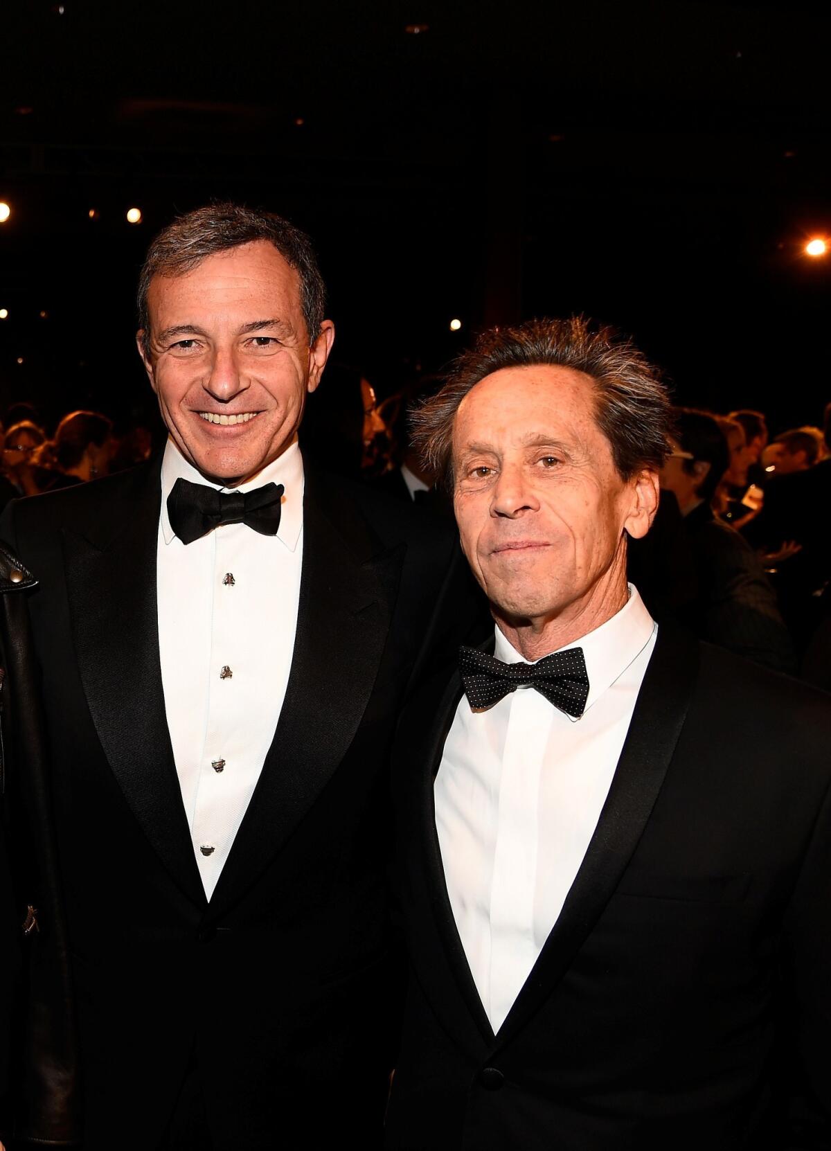 Walt Disney Co. Chairman and Chief Executive Robert Iger and producer Brian Grazer attend the 2014 LACMA Art + Film Gala.