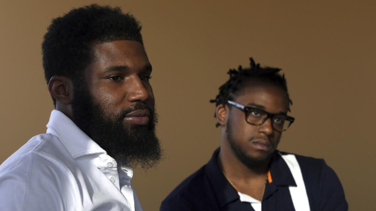 Rashon Nelson, left, and Donte Robinson settled with the city of Philadelphia on Wednesday.