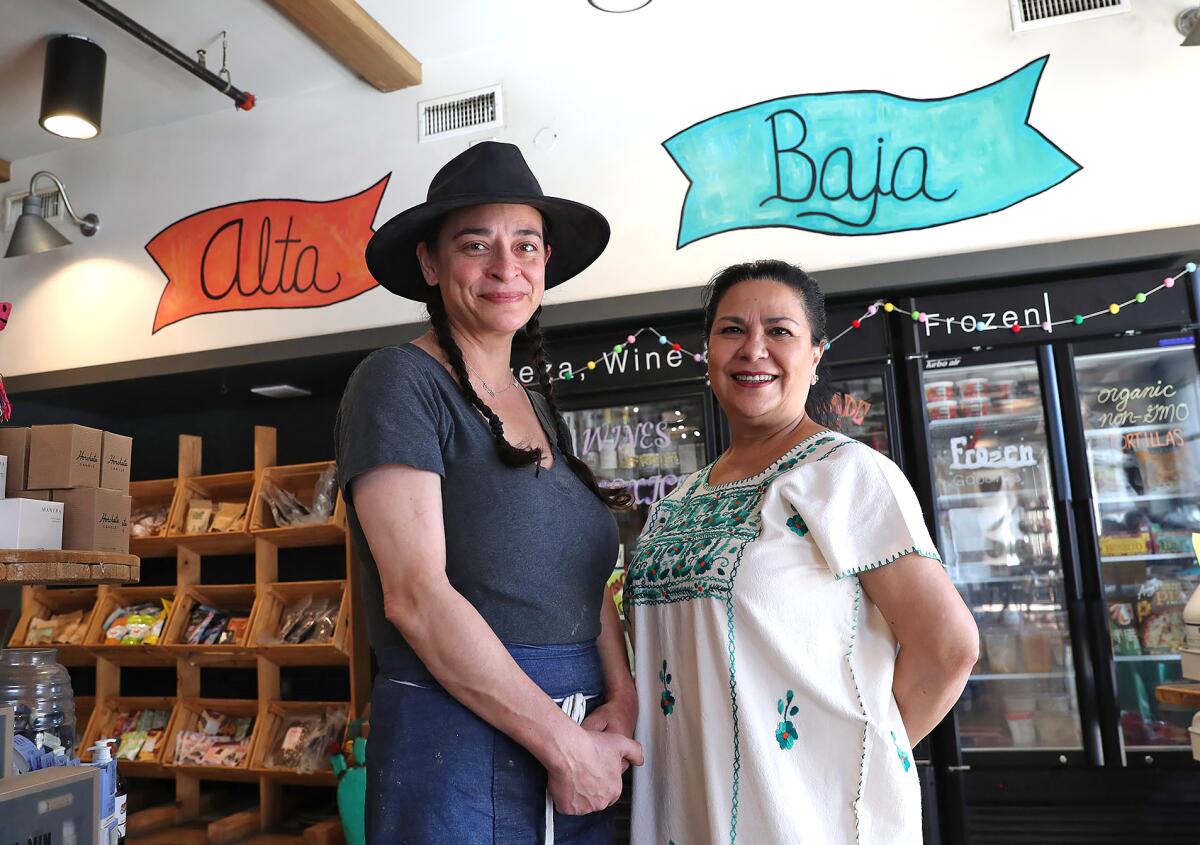 Alta Baja Market and cafe owner Delilah Snell and Loreta Ruiz of La Vegana Mexicana.