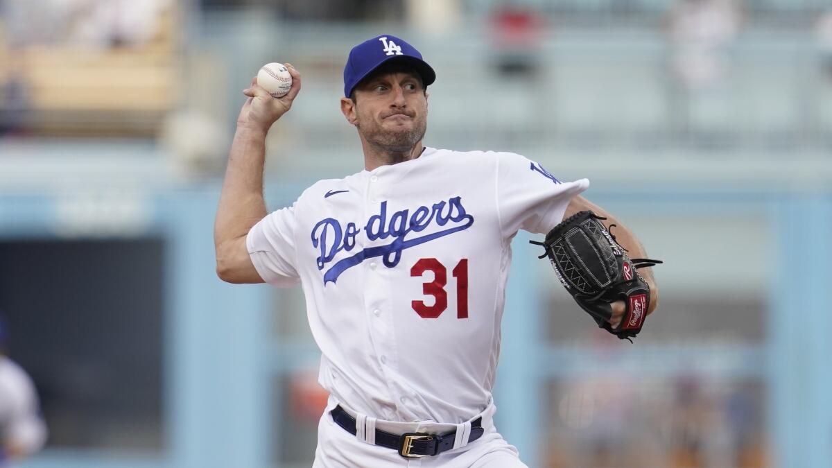 Dodgers starting pitcher Max Scherzer delivers against the St. Louis Cardinals in an NL wild-card game on Oct. 6.