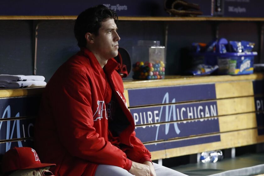 Los Angeles Angels pitcher Tyler Skaggs watches from the bench in the fifth inning of a baseball game against the Detroit Tigers in Detroit, Wednesday, May 8, 2019. (AP Photo/Paul Sancya)