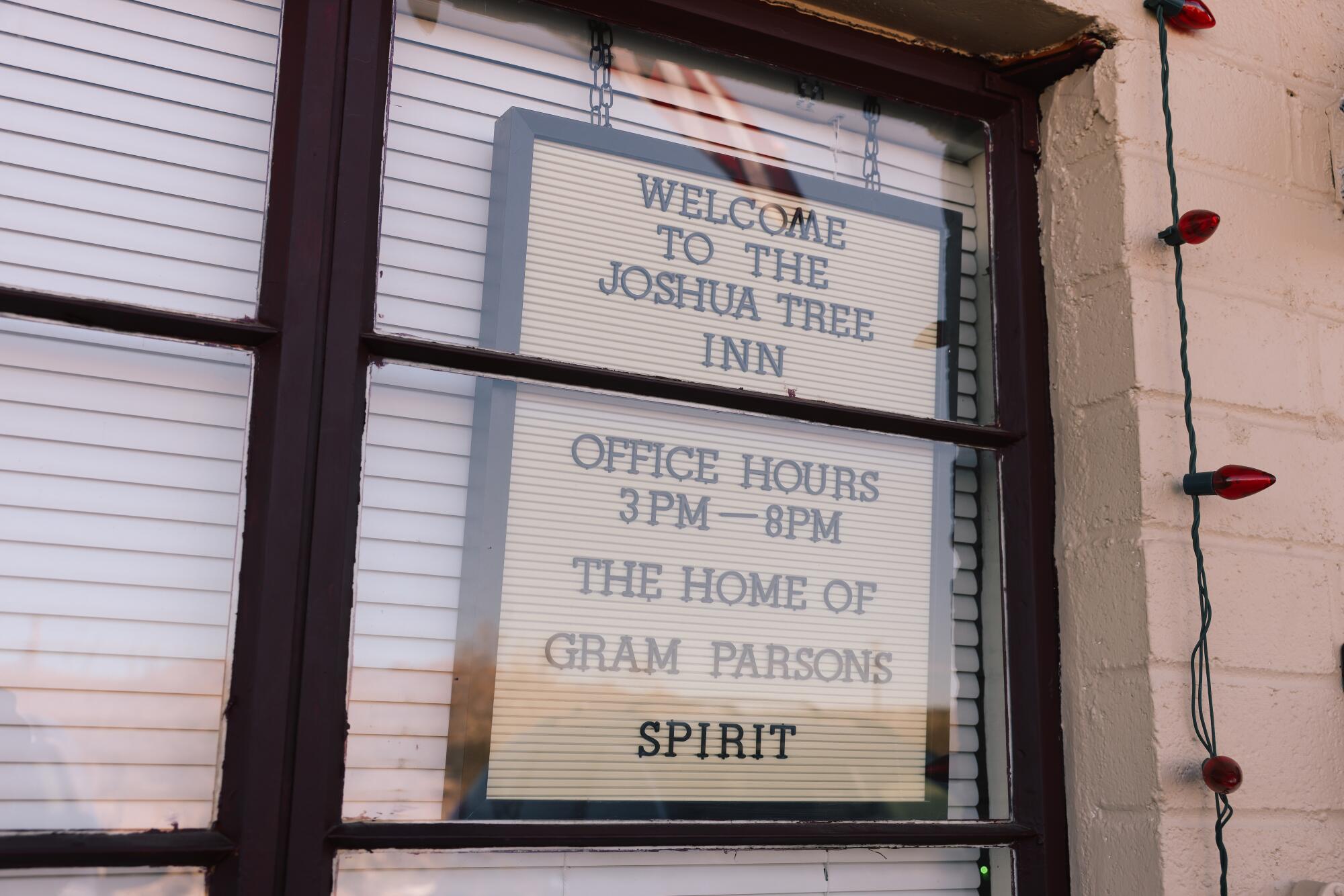 Signage welcomes folks to Joshua Tree Inn, the “home of Gram Parsons' spirit."