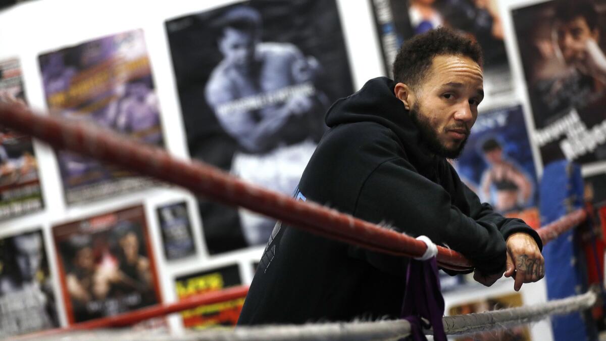 Pat Manuel takes a break after working out at his gym in Duarte.