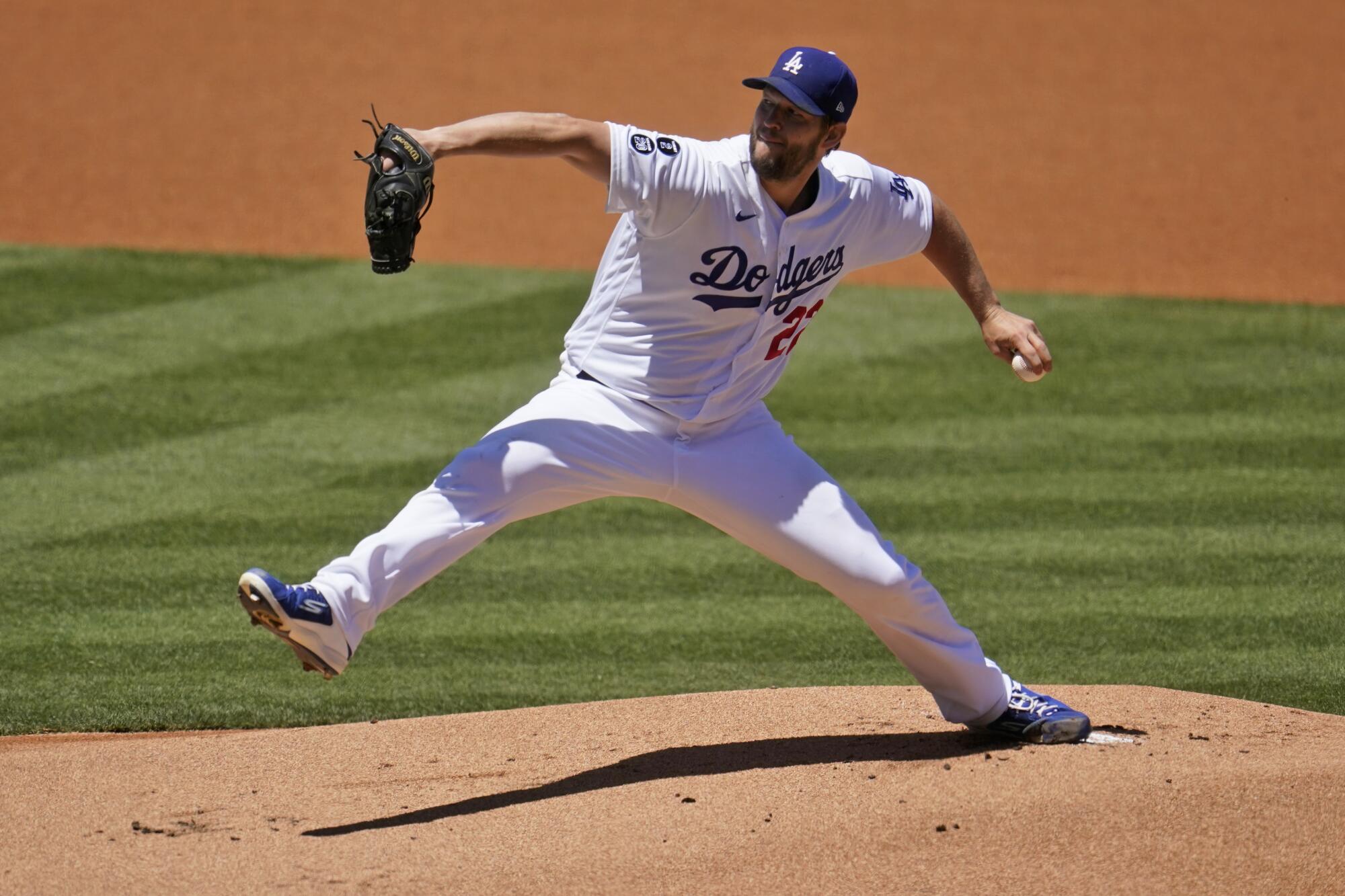 Los Angeles Dodgers starting pitcher Clayton Kershaw throws to the Cincinnati Reds.