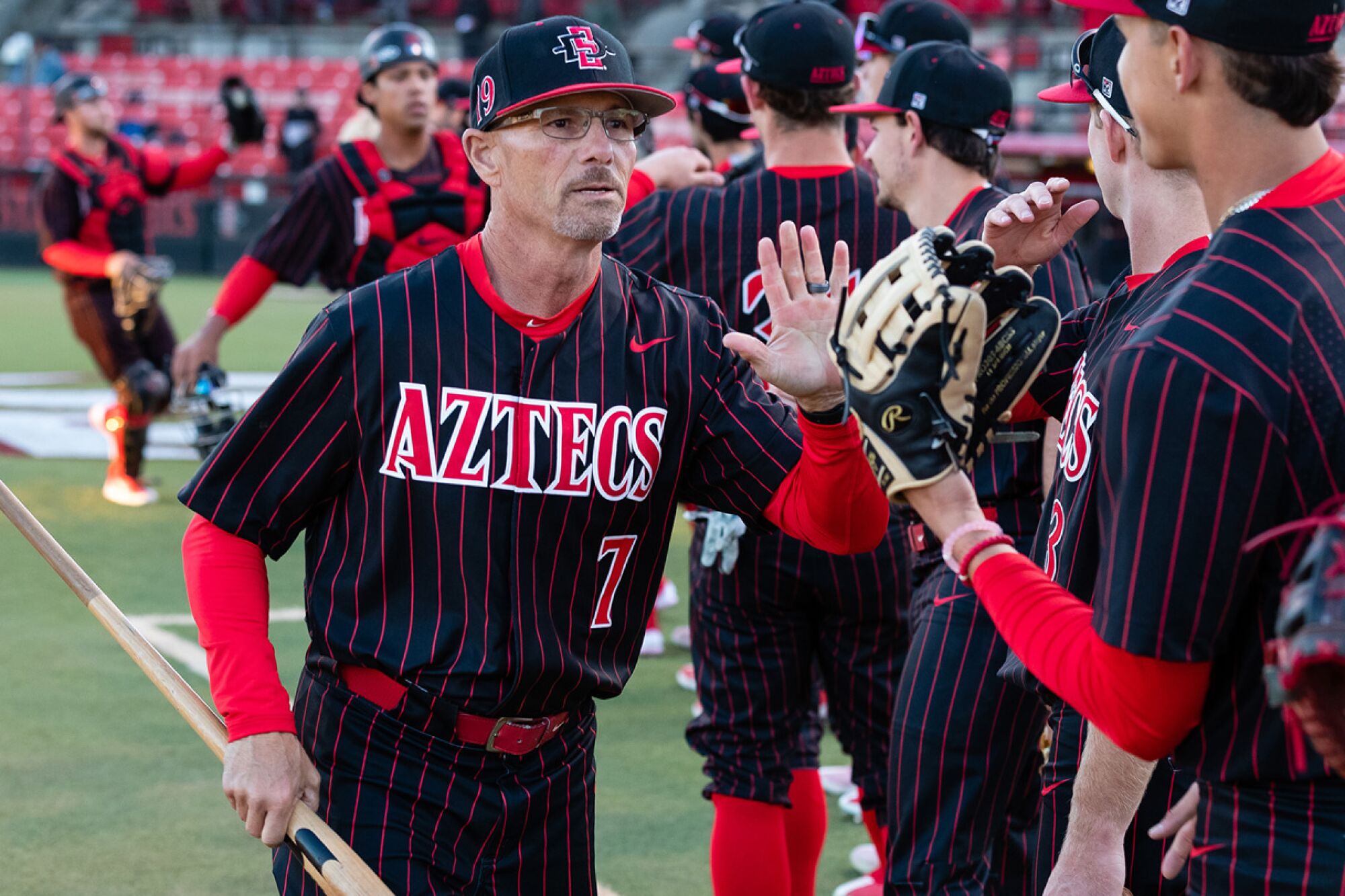 Coach Mark Martinez, part of San Diego State's baseball program since