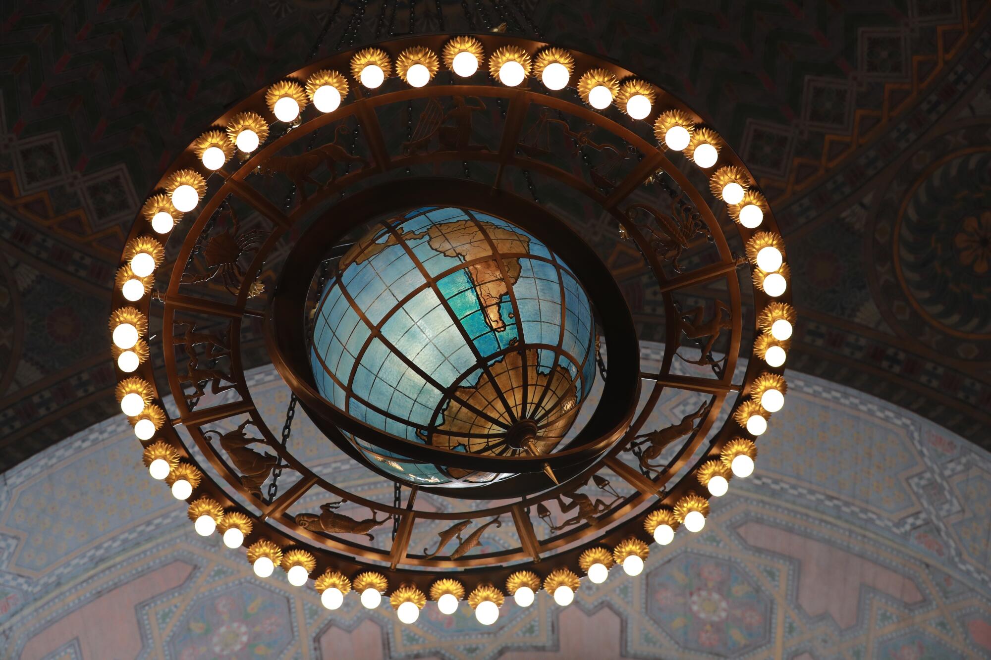 A view of a globe chandelier in the rotunda of the Los Angeles Central Library.