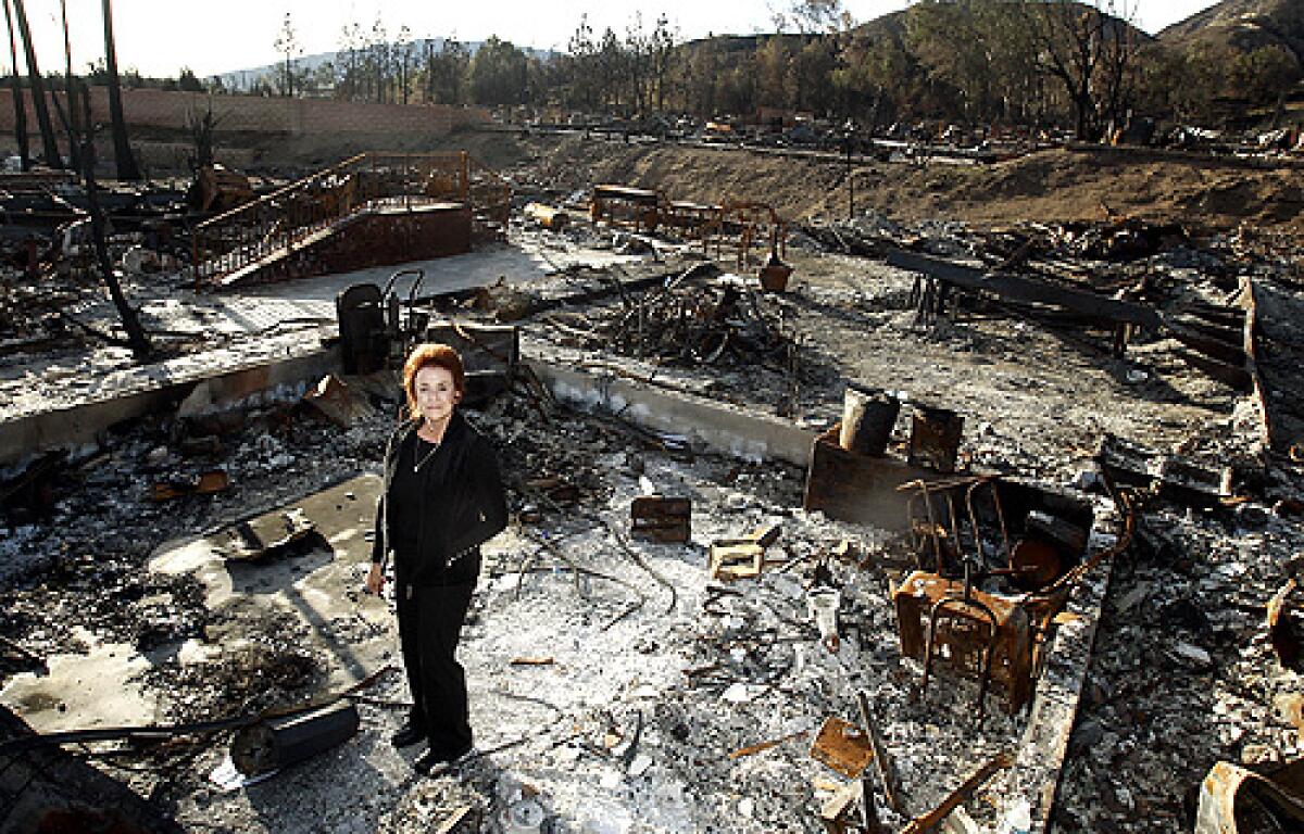 Manager Ginny Harmon lost everything in the Oakridge Mobile Home Park fire, but less than two months after the blaze destroyed or badly damaged more than 500 of the 600 homes there, she's doing everything she can to help all the residents get back on their feet.